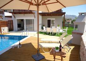 Next to Haraki beach , taverns bars & 10 to Lindos 3