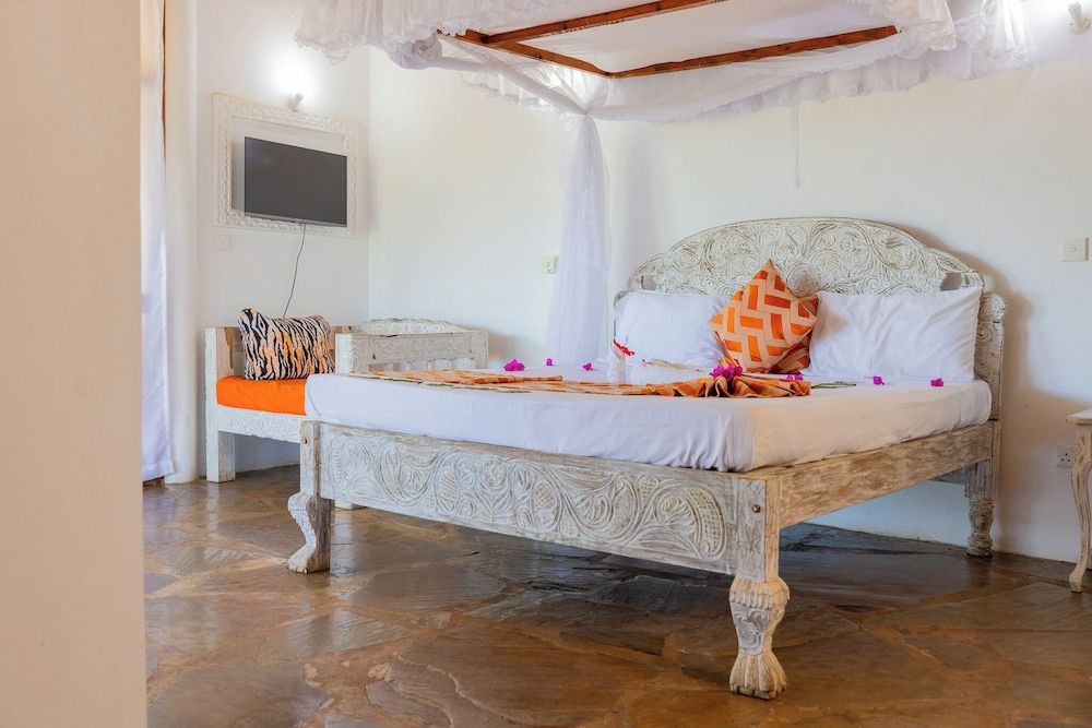 Paris - Malindi - Silver Rock Boutique Resort by Mokawa - Hotel & Apartments - Malindi
