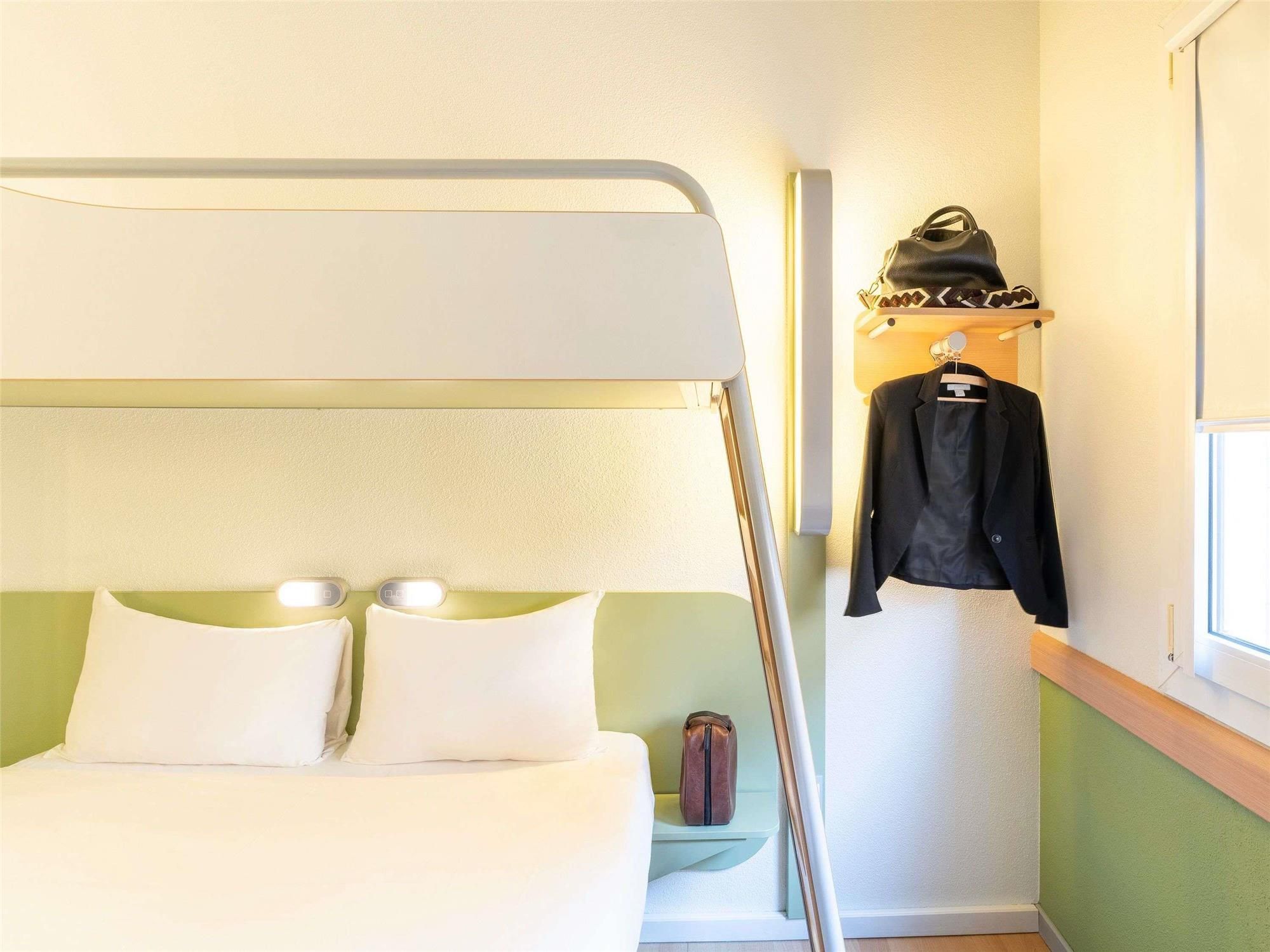 Room with double bed and bunk bed