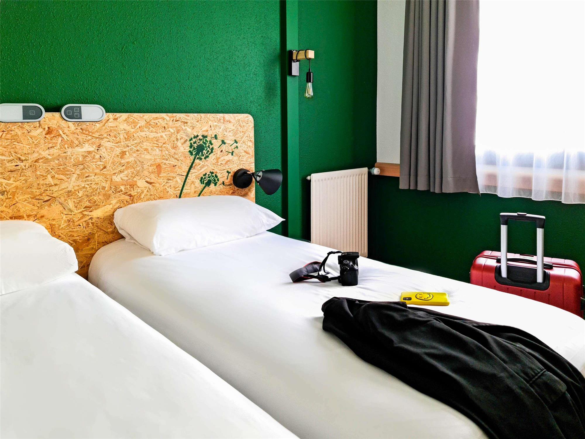 PURE Room room with double bed.
