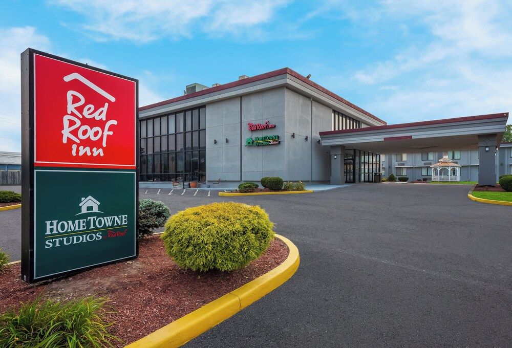HomeTowne Studios by Red Roof Painted Post 1