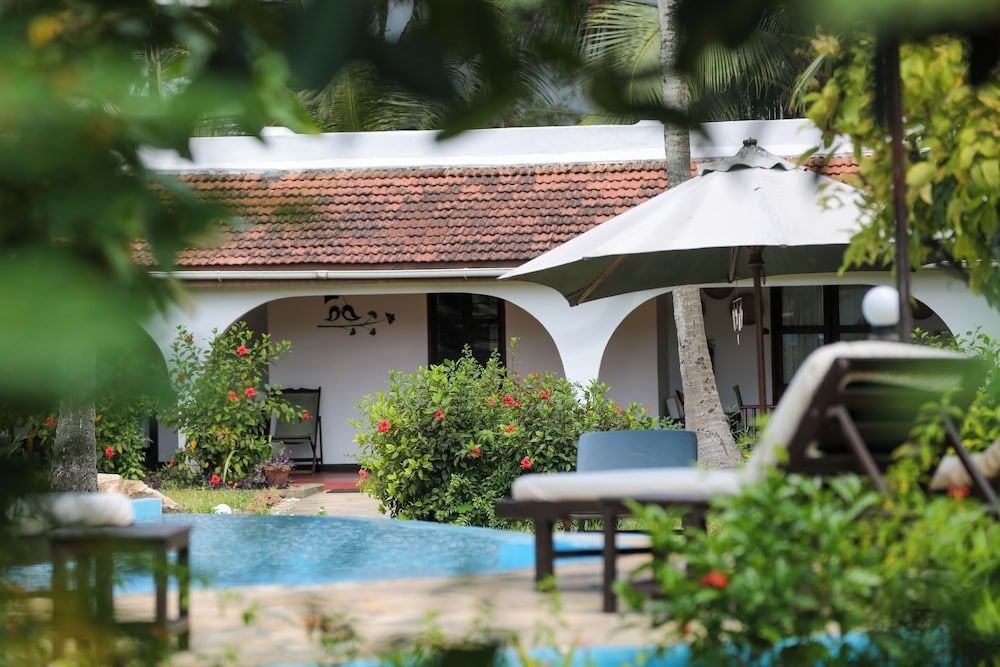 Flame Tree Cottages 1
