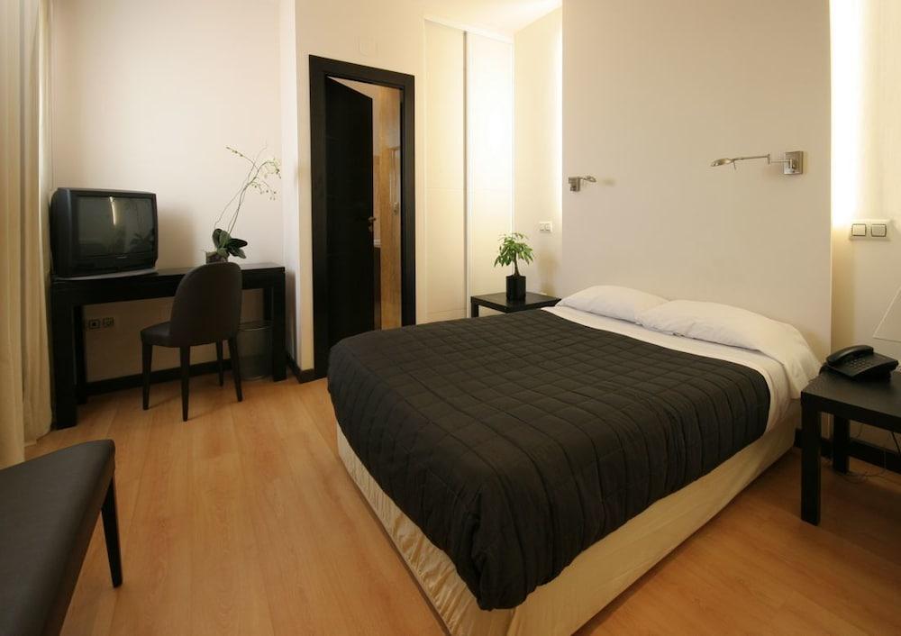 hotel asador versus 2
