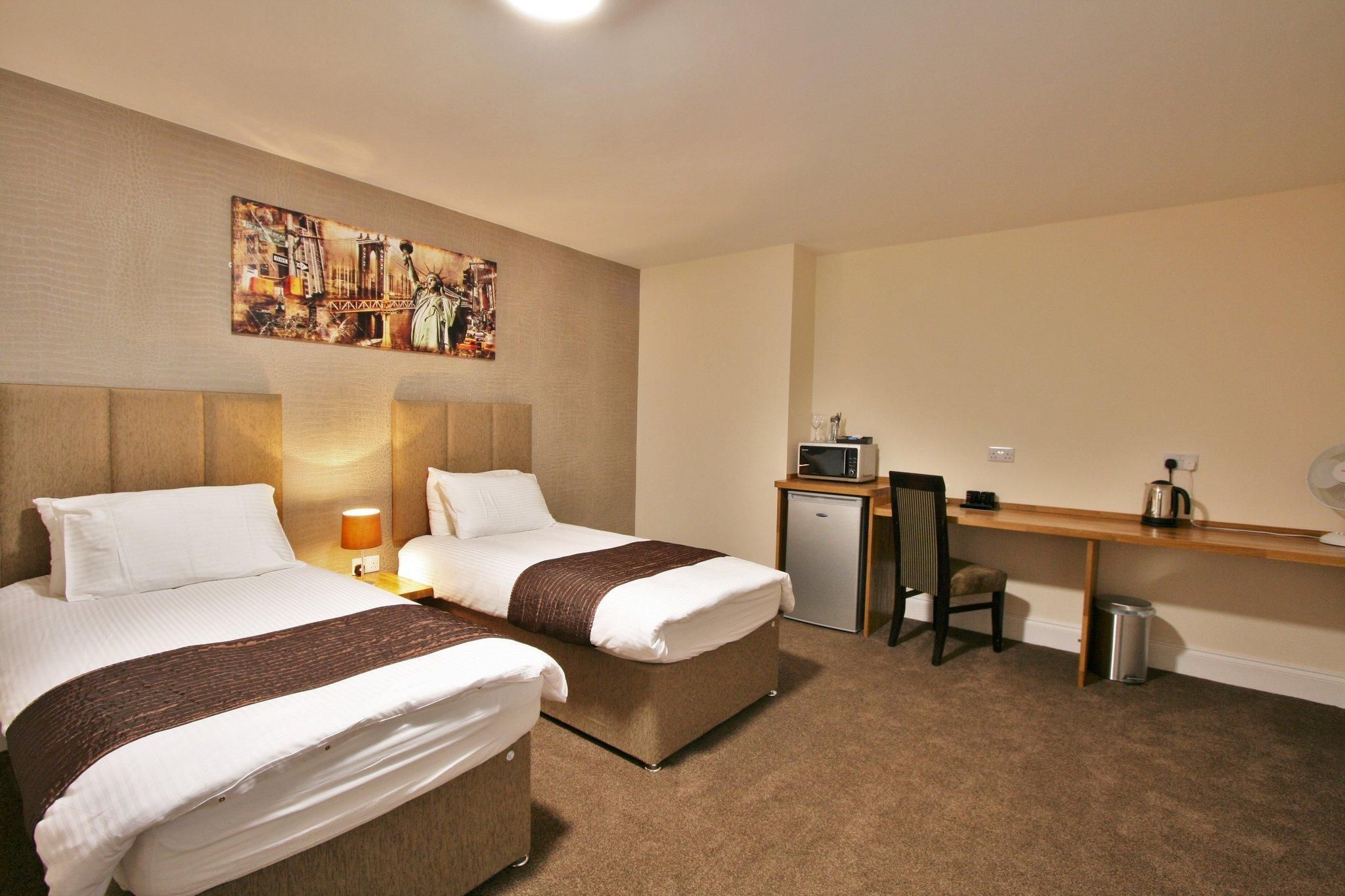 New County Hotel & Serviced Apartments by RoomsBooked 2