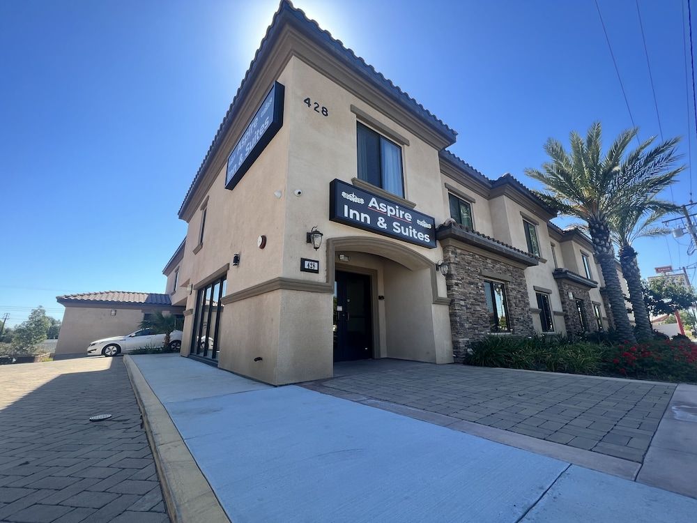 ASPIRE INN & SUITES Orange 1