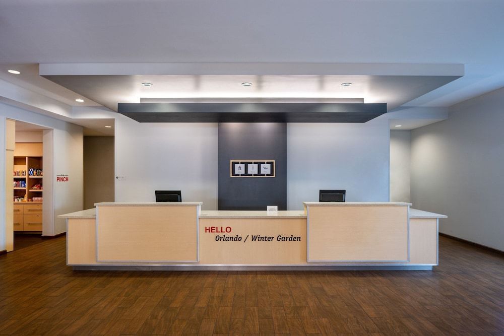 TownePlace Suites Orlando at FLAMINGO CROSSINGS Town Center, Western Entrance 2