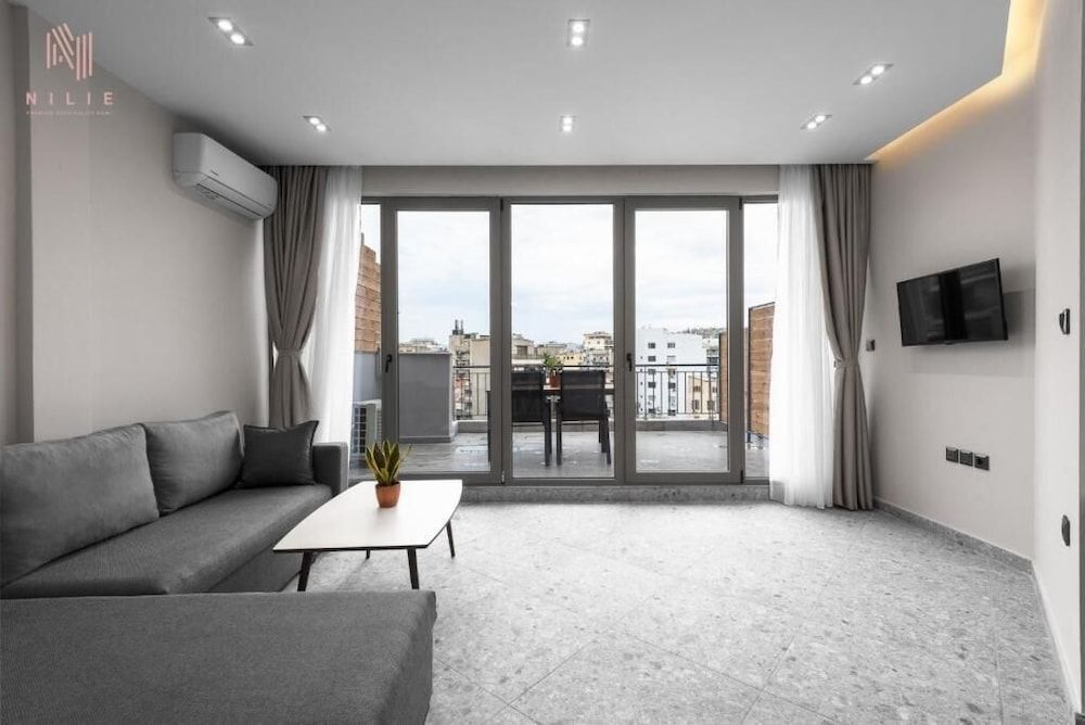 Avenue Studios & Apartments, Nilie Hospitality MGMT 1