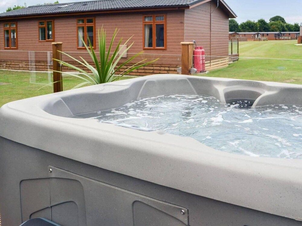 Boutique lodge with hot tub sleeps 6 1