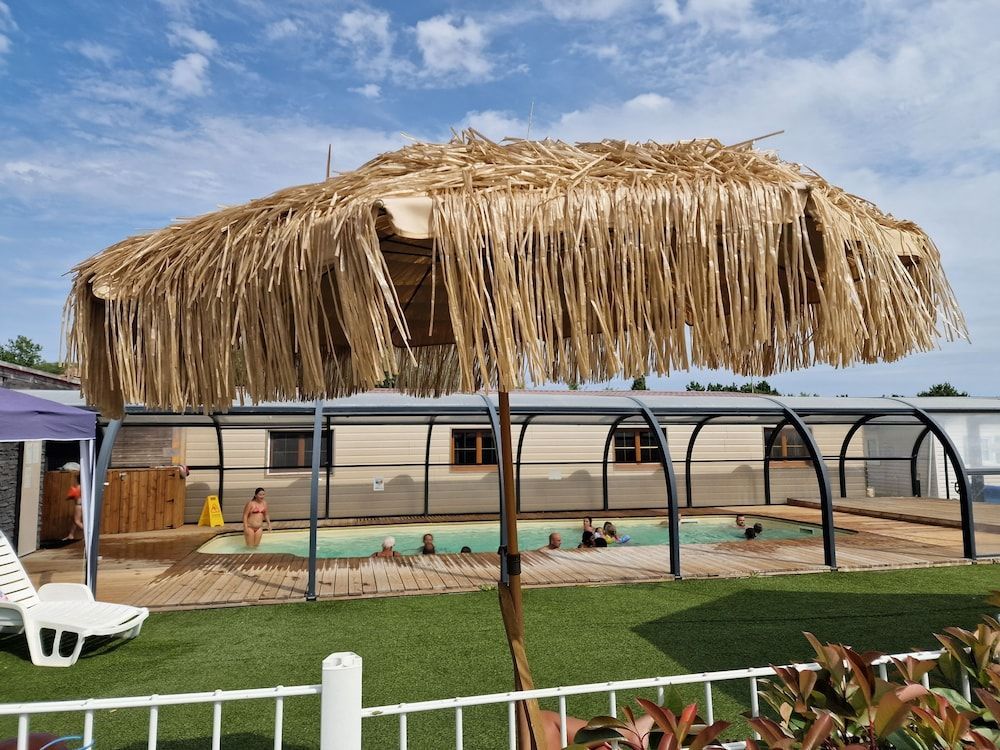 Camping Les P'tites Maisons dans la Prairie 1