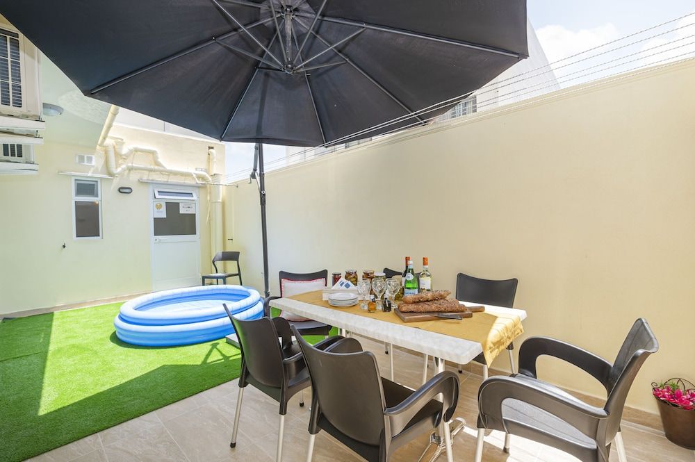 Summer Breeze Maisonette with Terrace by Getaways Malta 1