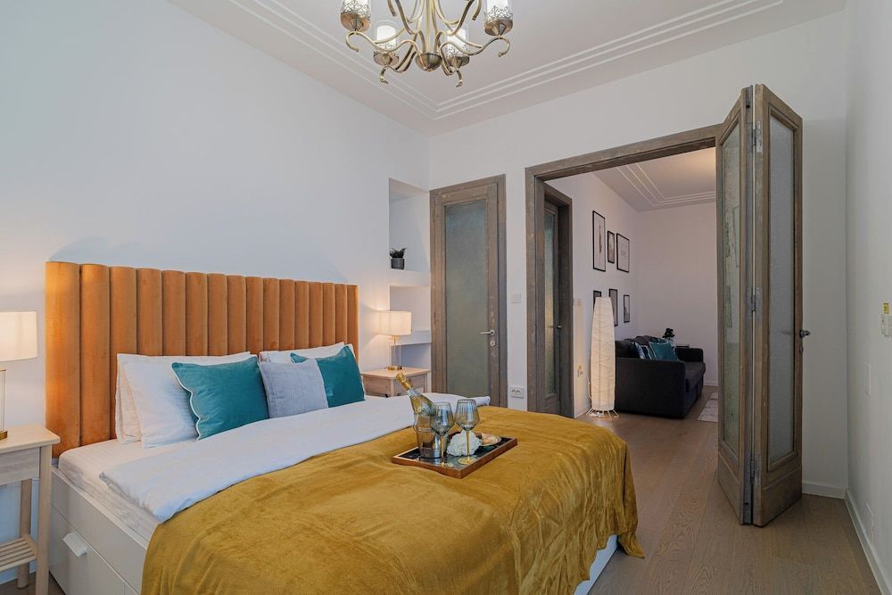 Top-Floor Romanian Athenae 2BR Apartment, Quiet City Views 1