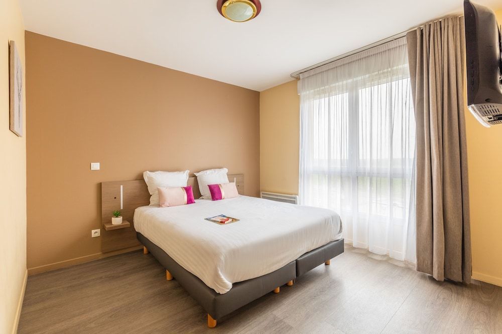 Zenitude Hôtel-Résidences Magny-les-Hameaux 1