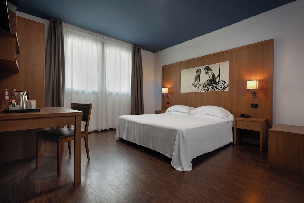 Romeo e Giulietta Residenze check-in presso Hotel Toscanini 2