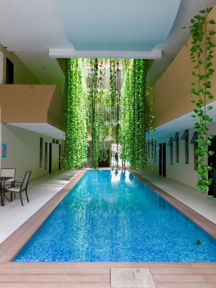 Palmarena Rooms & Residences - Long Stay Comfort with Parking, Sauna, Gym & Pool - Steps from 5th Avenue 1