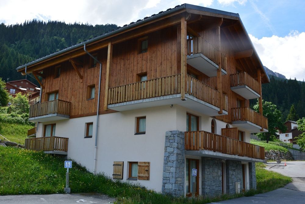 Vacancéole - Résidence Les Chalets de la Ramoure 1