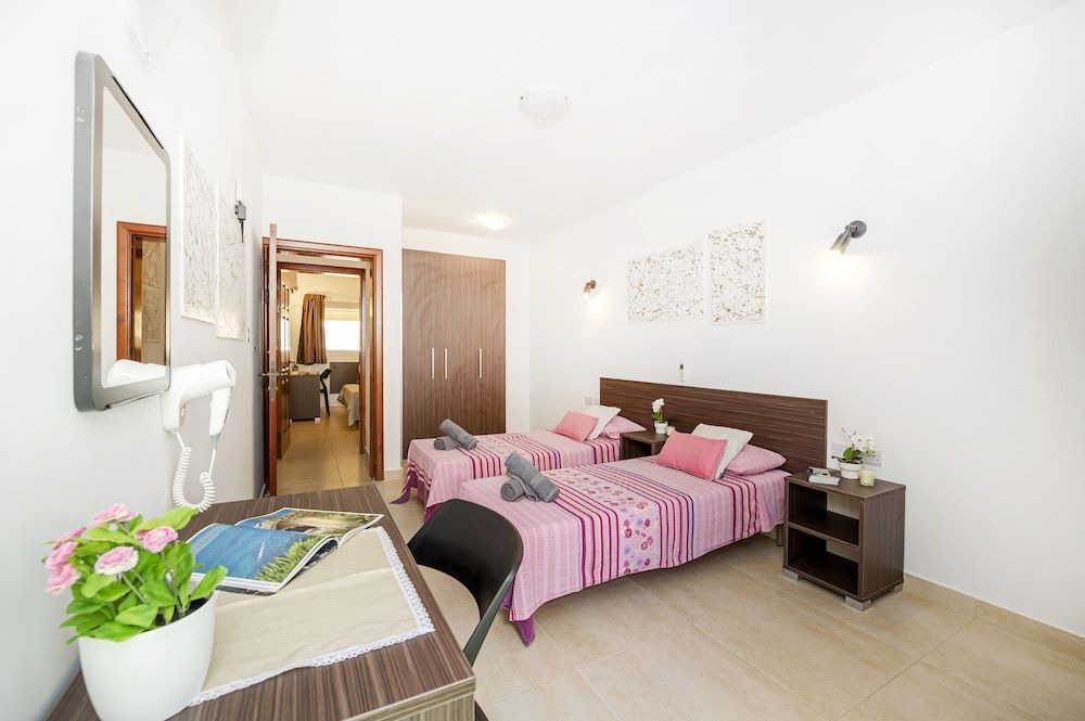 Summer Breeze Maisonette with Terrace by Getaways Malta 2