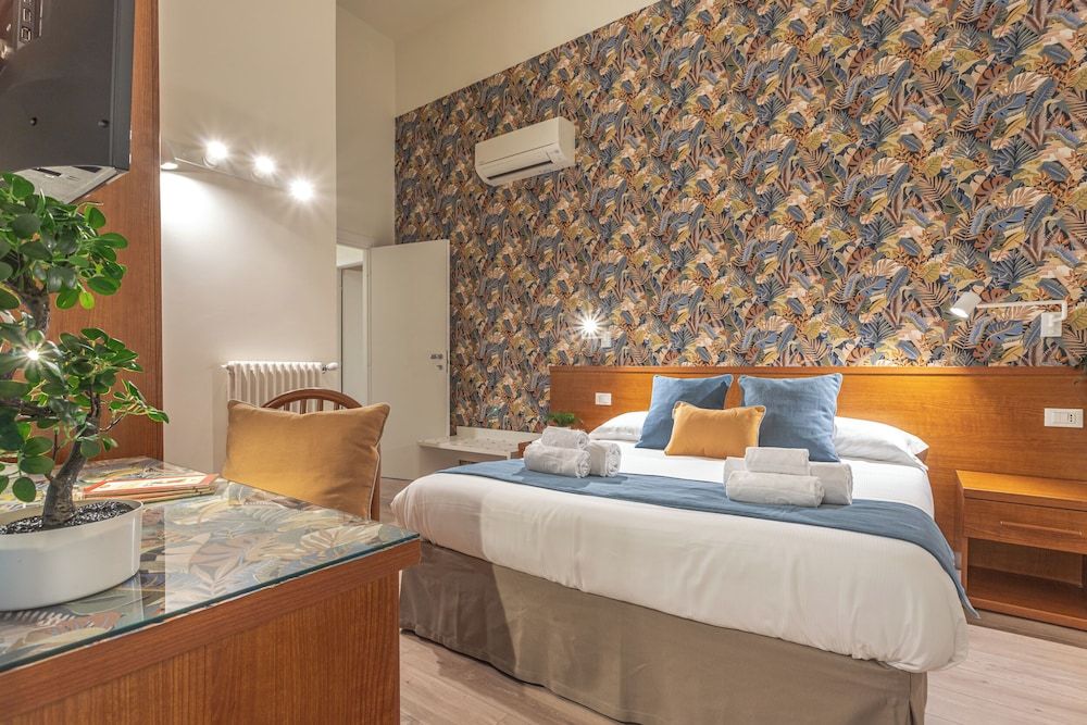 Vittoria Garden Suites Elegant Guesthouse Near Colosseum 1