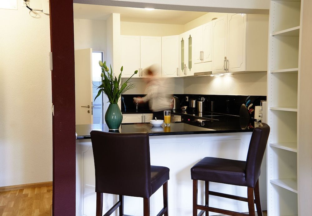 Residence Apartments by Hotel du Commerce 1