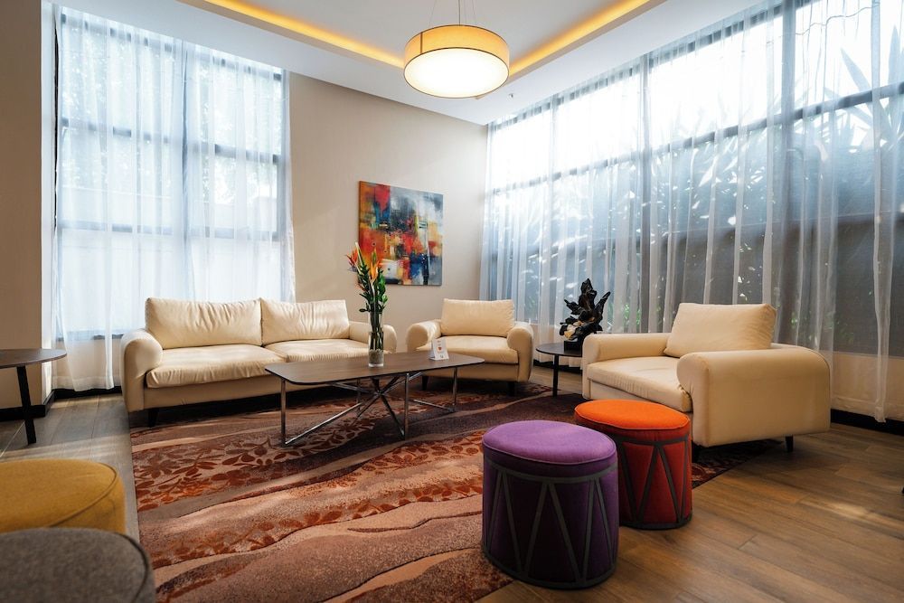 Trademark Suites at Enaki Town 1