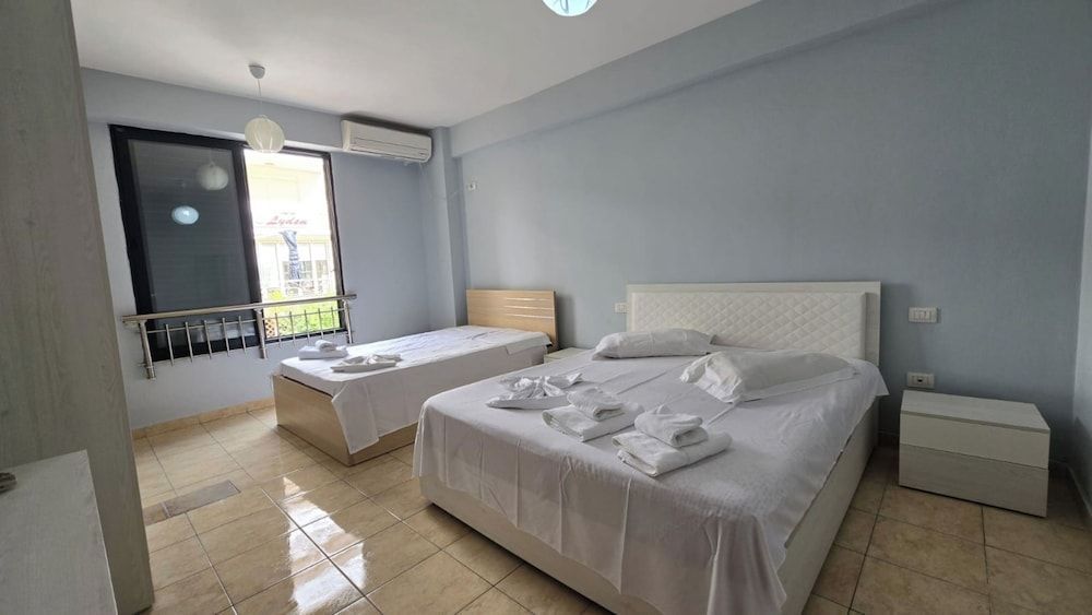 Tirent Apartment - Cozy Bedrooms Stay by Golem Beach. 1
