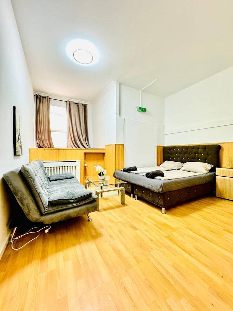 10 Economy Rooms-Shared Bath & Kitchen 1