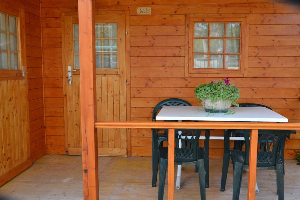 Wooden Chalet with Terrace near Sea 1