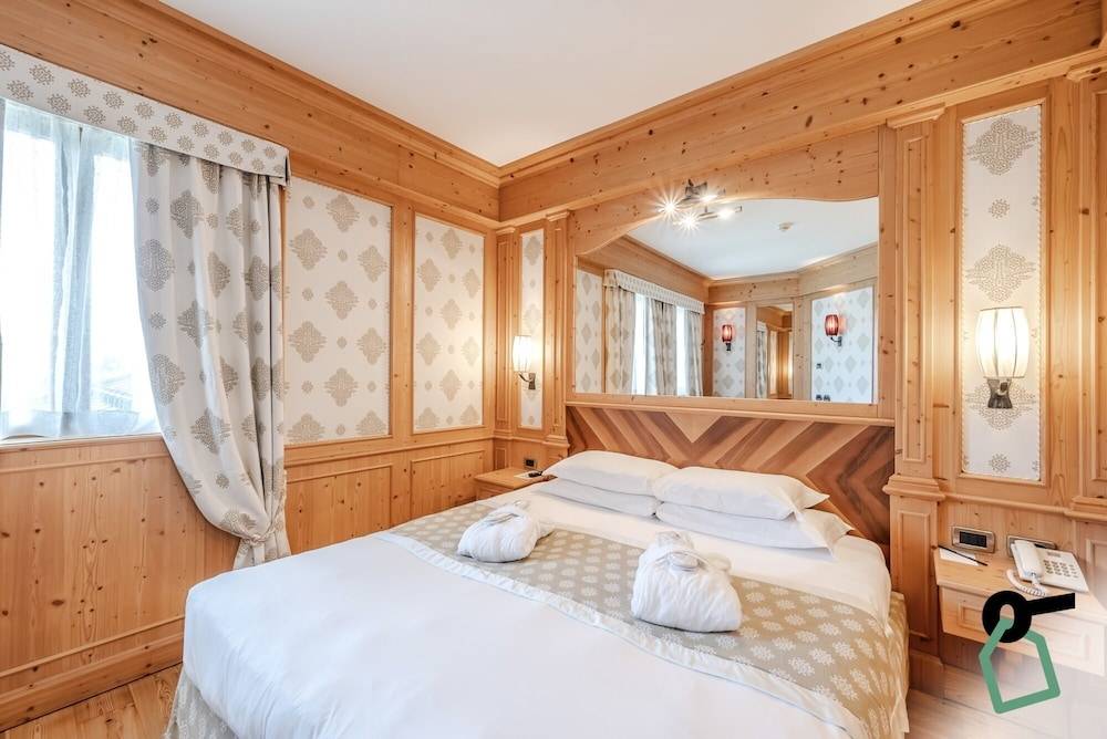 HOTIDAY Room Collection - Campiglio Pradalago 1