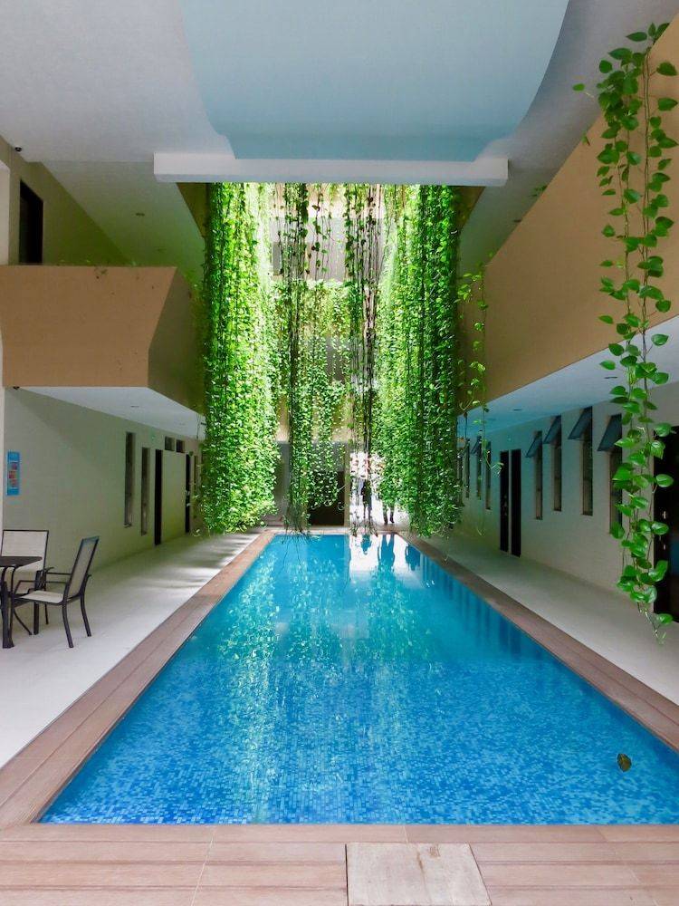 Palmarena Rooms & Residences - Long Stay Comfort with Parking, Sauna, Gym & Pool - Steps from 5th Avenue 1