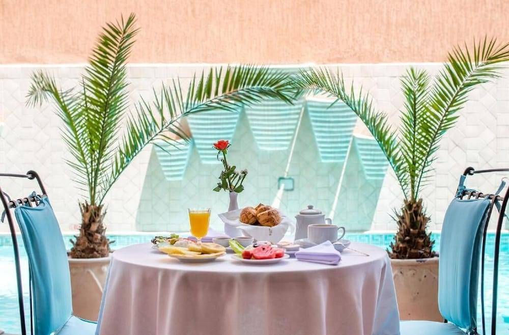Hôtel Les Trois Palmiers 1