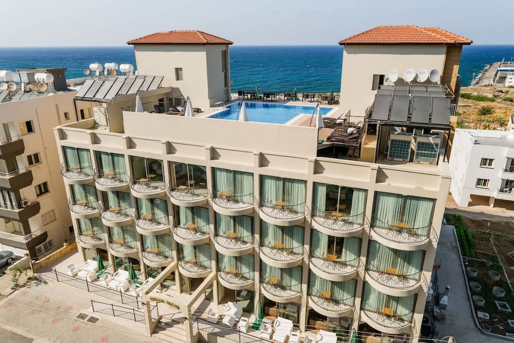 Olivia Palm Hotel 1