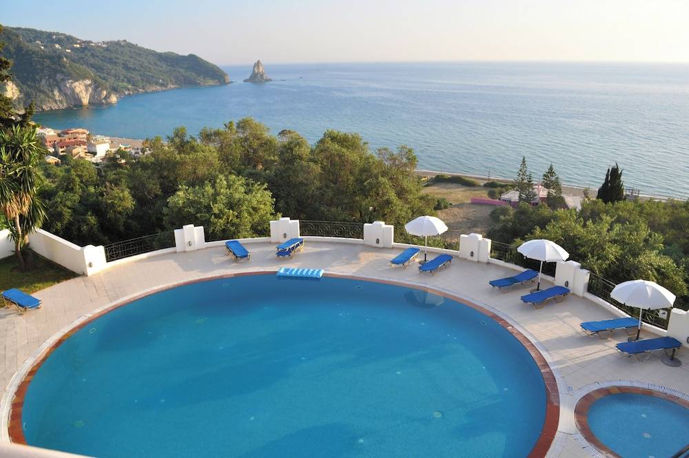 Studio apartments with pool maria in Agios Gordios Beach 1