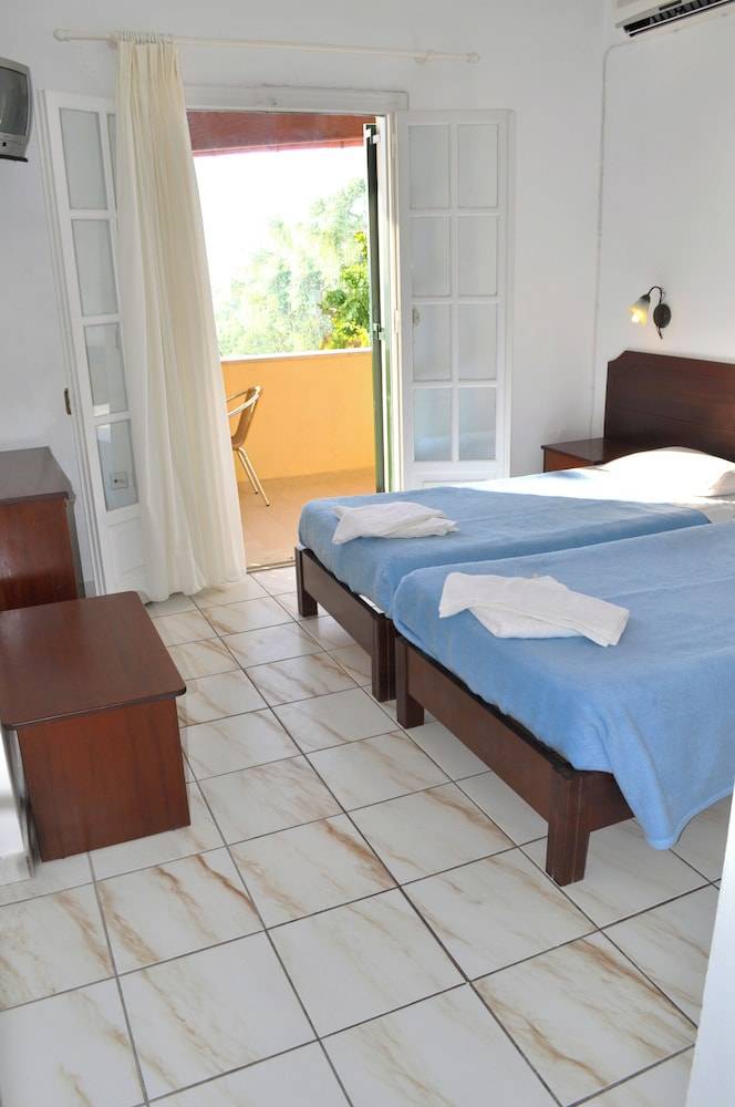 Studio apartments with pool maria in Agios Gordios Beach 2