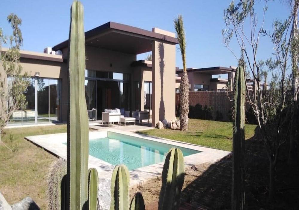 Palms Edge Villas avec Piscine & Jardin Privés 1