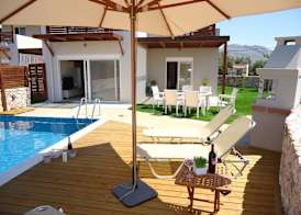 Next to Haraki beach , taverns bars & 10 to Lindos 3