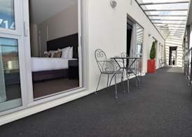 Quality Suites Amore 4