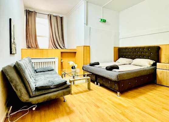 10 Economy Rooms-Shared Bath & Kitchen 1