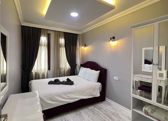 TAKSİM CMLM Suit 1
