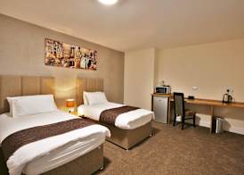 New County Hotel & Serviced Apartments by RoomsBooked 2