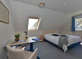 Hotel- & Ferienanlage Kapitäns-Häuser Breege 4