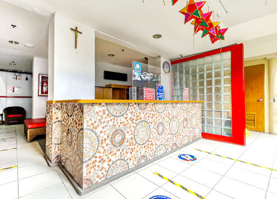 Vaccinated Staff - OYO 842 City Smiles Apartelle 1