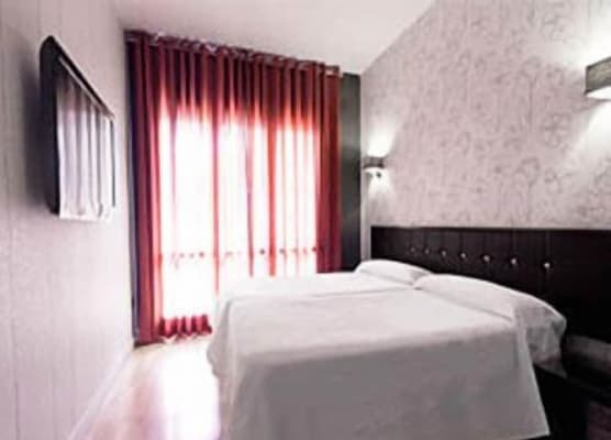 Hospedium Hostal Un Punto Chic 1