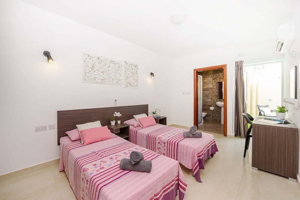 Summer Breeze Maisonette with Terrace by Getaways Malta 4