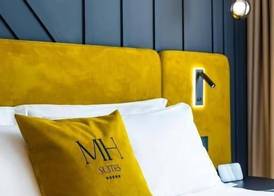 MH SUITES Plebiscito 4