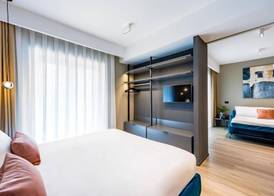 MH SUITES Plebiscito 5