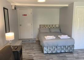 Grey Stone Studio Apartments 3