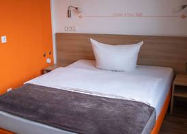 Orange Hotel und Apartments 3