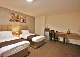 New County Hotel & Serviced Apartments by RoomsBooked 2