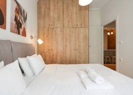 Contemporary apartment made of wood and stone. 5