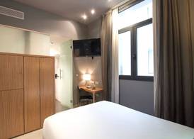 Petit Palace Tres Cruces 5