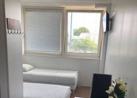 Paris en train Area Studios avec salles de bain et kitchenettes privées ou chambres avec salles de bain et cuisines communes 2